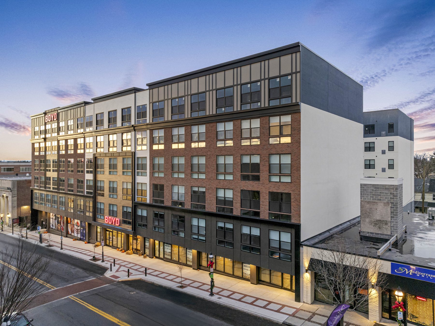 a high rise building by a street