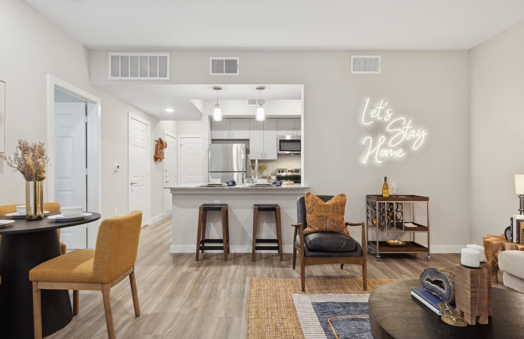 living room with view of a kitchen