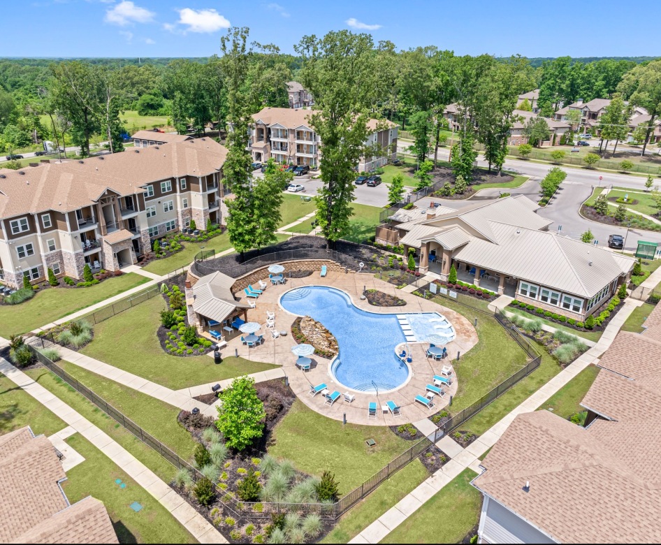 aerial view of apartments and pool