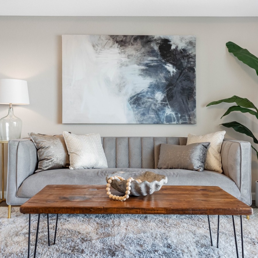 Grow With Us living room with couch and coffee table