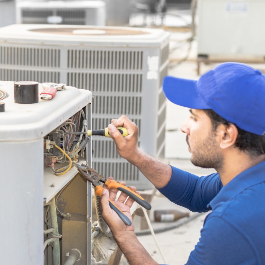 A Lifestyle That Elevates a mechanic working on a air unit
